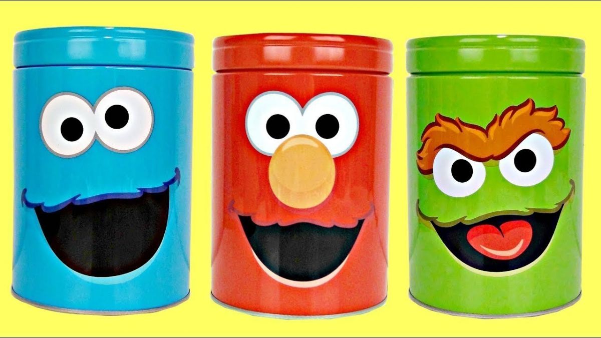 nat_and_essie_count_with_sesame_street_coin_bank_surprises